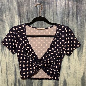 Blue and white polka dot cropped top